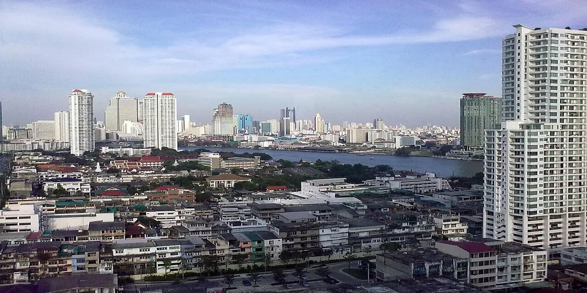 Bangkok skyline at dusk with the Chao Phraya river